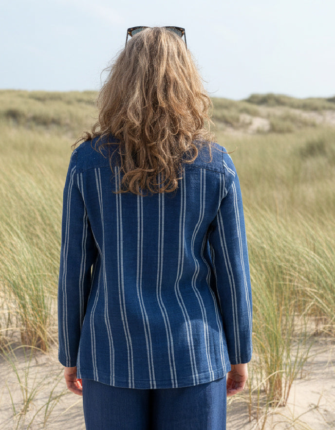 woman wearing chambray denim shirt jacket with pinstripes