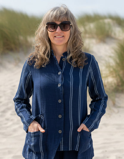 woman wearing chambray denim shirt jacket with pinstripes
