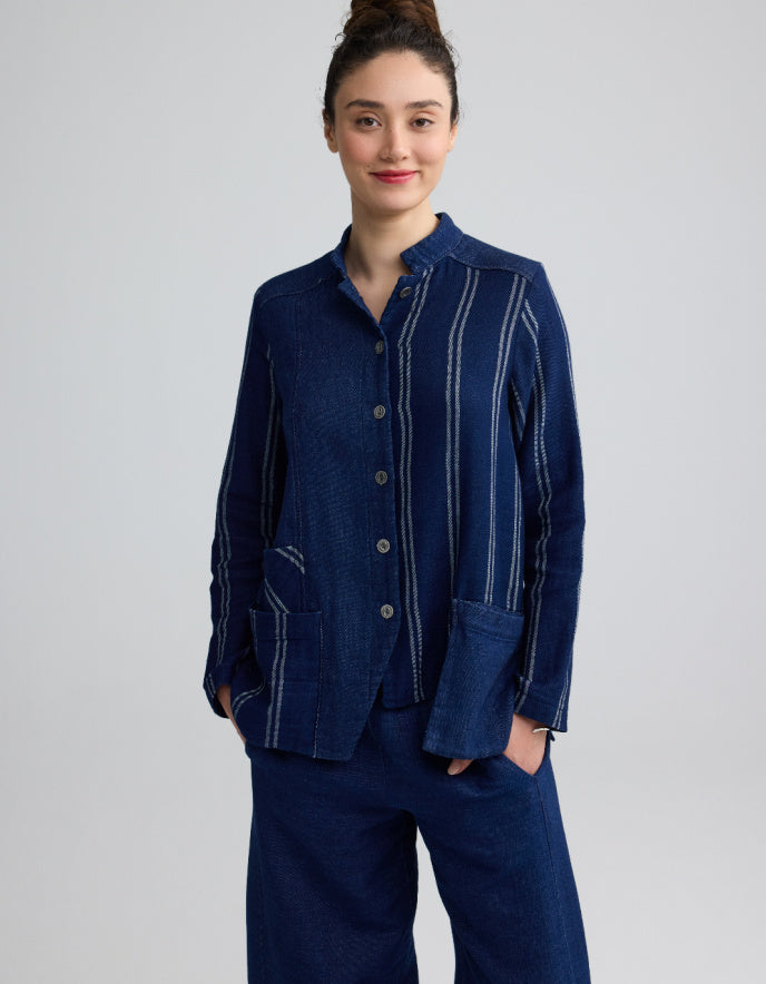 woman wearing chambray denim shirt jacket with pinstripes