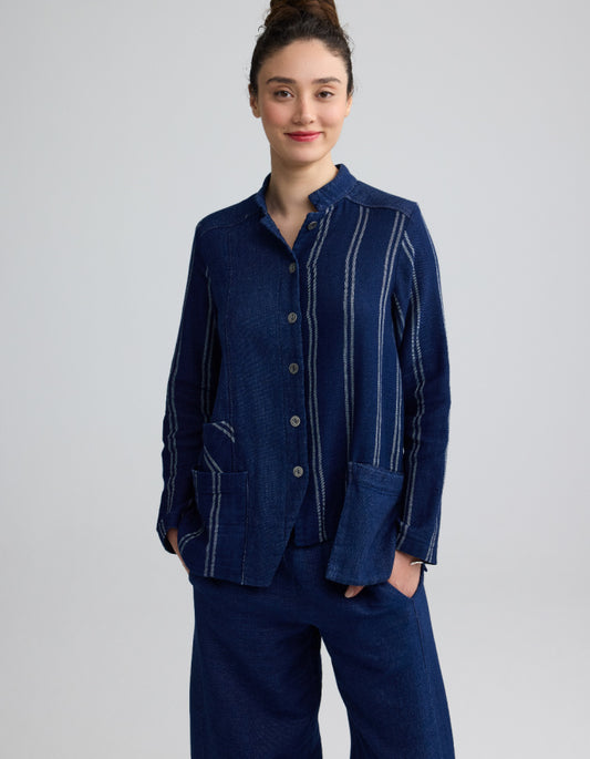 woman wearing chambray denim shirt jacket with pinstripes