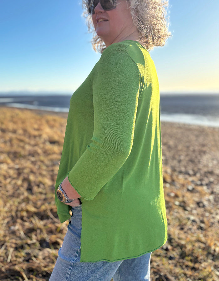 lightweight green viscose blend sweater with A-line shape