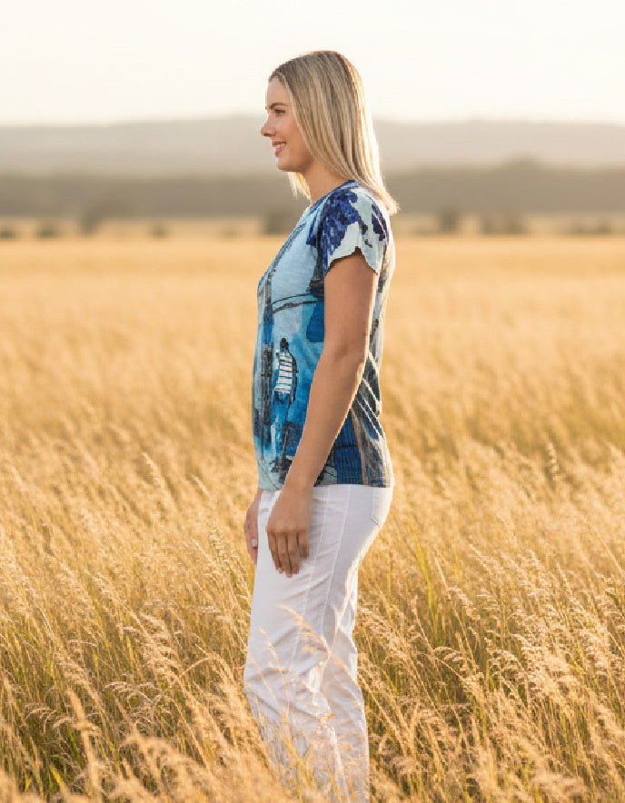 woman wearing graphic blue cotton t shirt