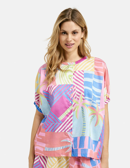 oversized cotton blouse with tropical print inn pastel bright shade