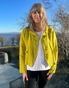 yellow linen summer jacket  with 4 buttons at the front and full length sleeves pockets