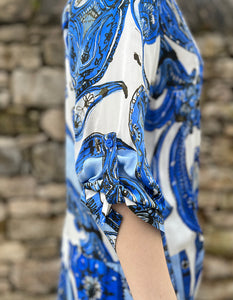 blue and white paisley print tiered knee length dress with sleeves