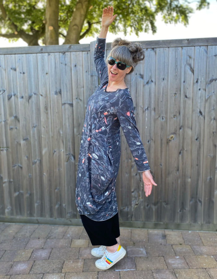 grey cotton bubble dress with pockets and long sleeves with doodle print