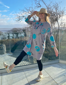 grey cotton stretch jersey tunic with turquoise fish print and half zip, two pockets with zip closure