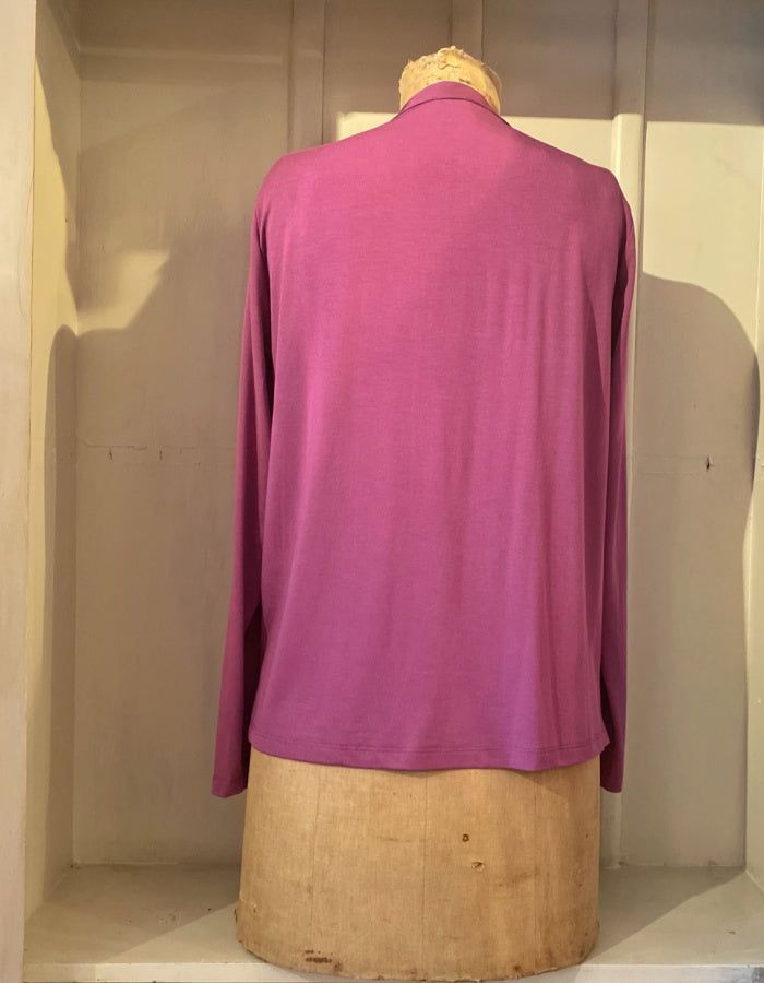 silky blouse with keyhole closure at the collar and full length sleeves in foxglove purple