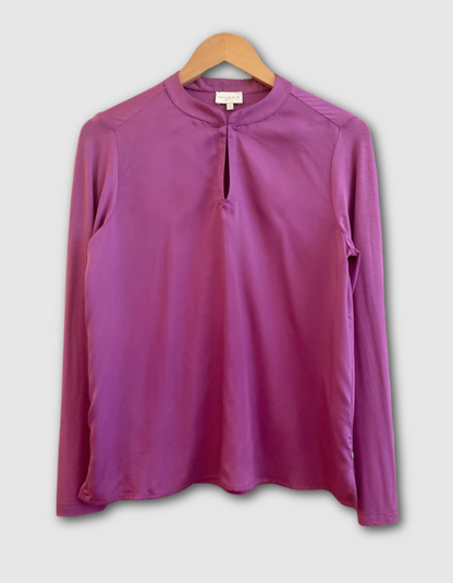 silky blouse with keyhole closure at the collar and full length sleeves in foxglove purple