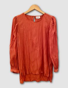 pumpkin orange silk feel scoop neck blouse with lantern sleeves, crinkle finish